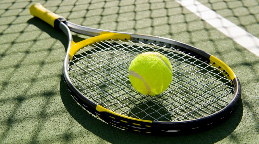 tennis rackets on court